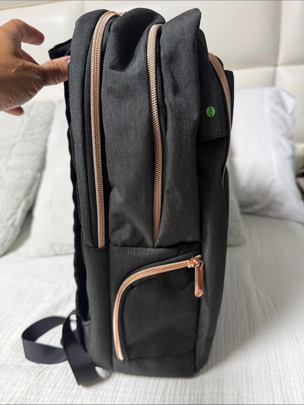 Used Black women Backpack with Rose Gold Accents